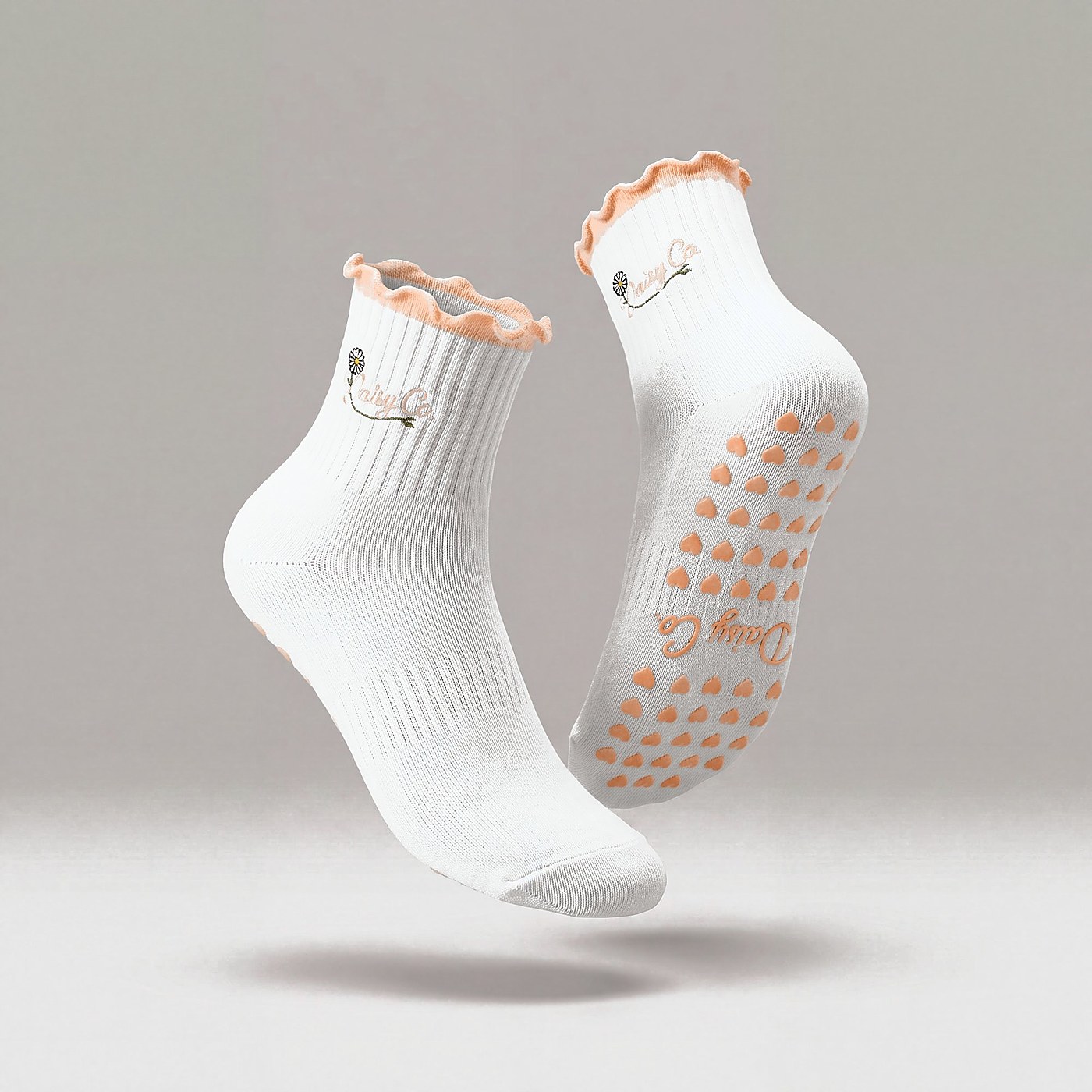 Coral Kiss pilates grip socks by Daisy Co.
