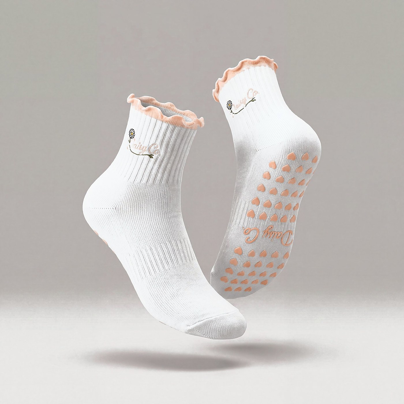 Bare Muse pilates grip socks by Daisy Co.